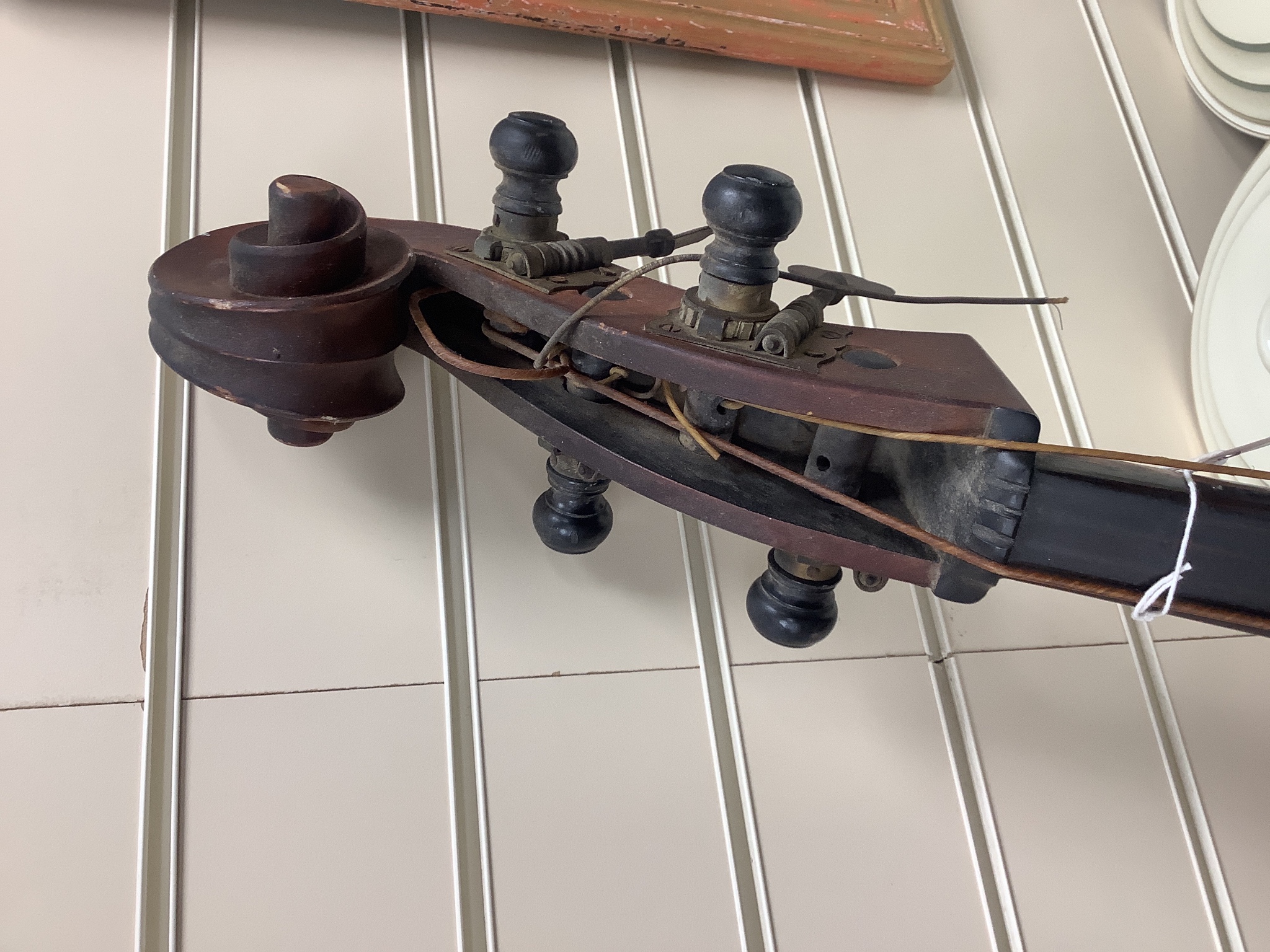 A double bass and three various violins, double bass 165cms high